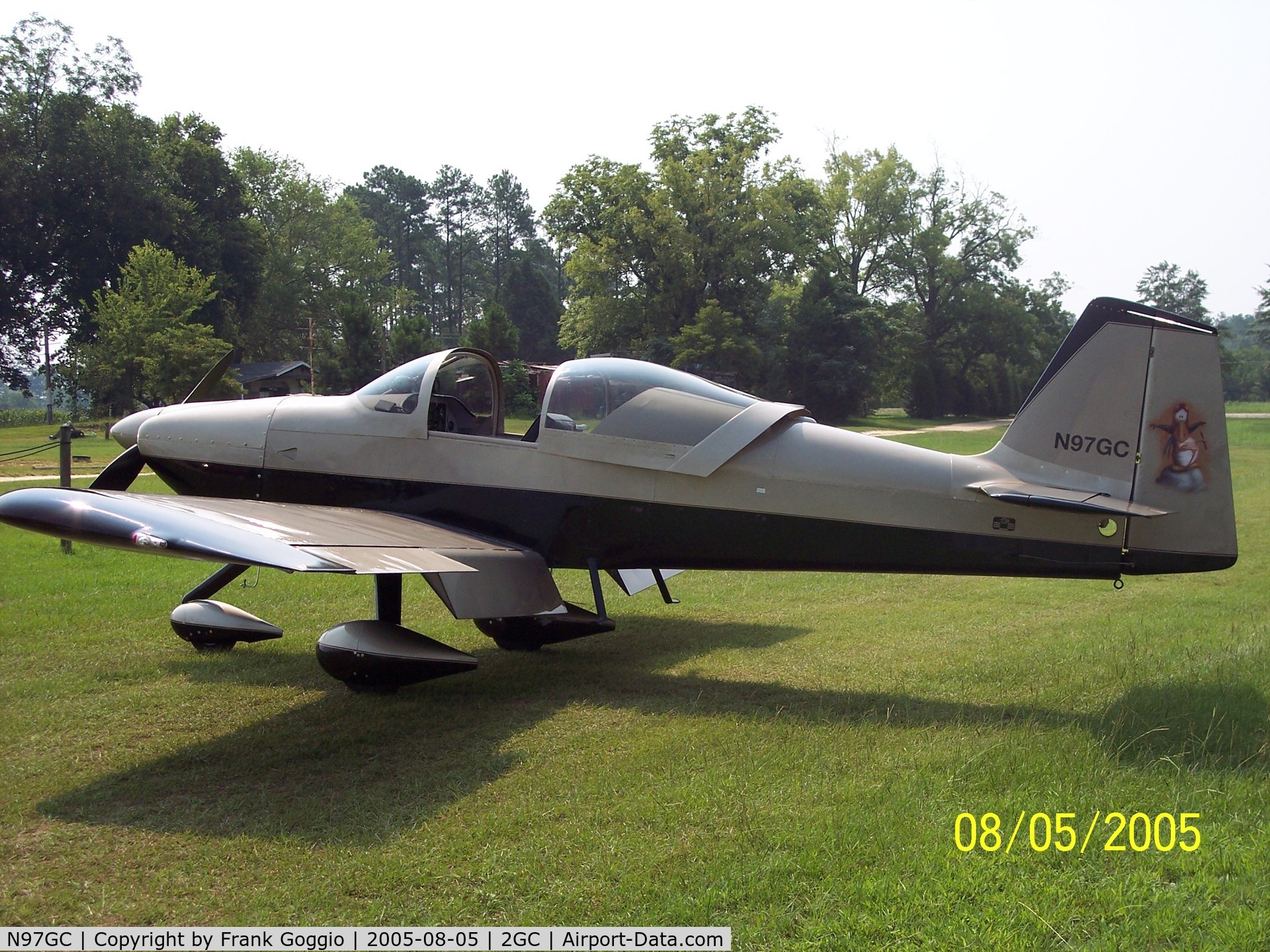 N97GC, Vans RV-6A C/N 25611, Black & Gold RV6-A with cartoon character 'Opus' on tail