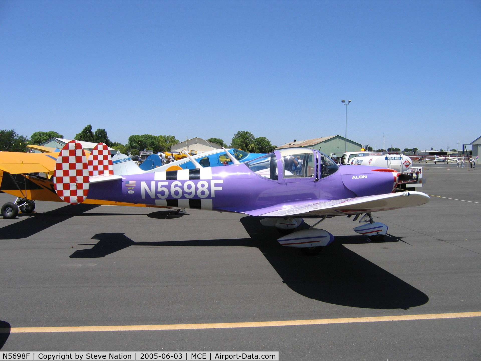 N5698F, 1966 Alon A2 Aircoupe C/N A-198, 1966 Alon A2 in purple colors with r/wh > tail & bk/w D-Day stripes at Merced, CA