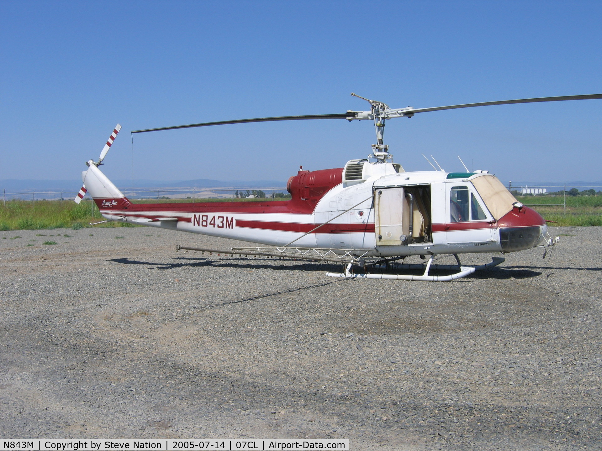 N843M, 1963 Bell UH-1B C/N 63-8676, Av Ag Inc. 1963 Bell UH-1B (63-8676) rigged as sprayer at their Richvale, CA base