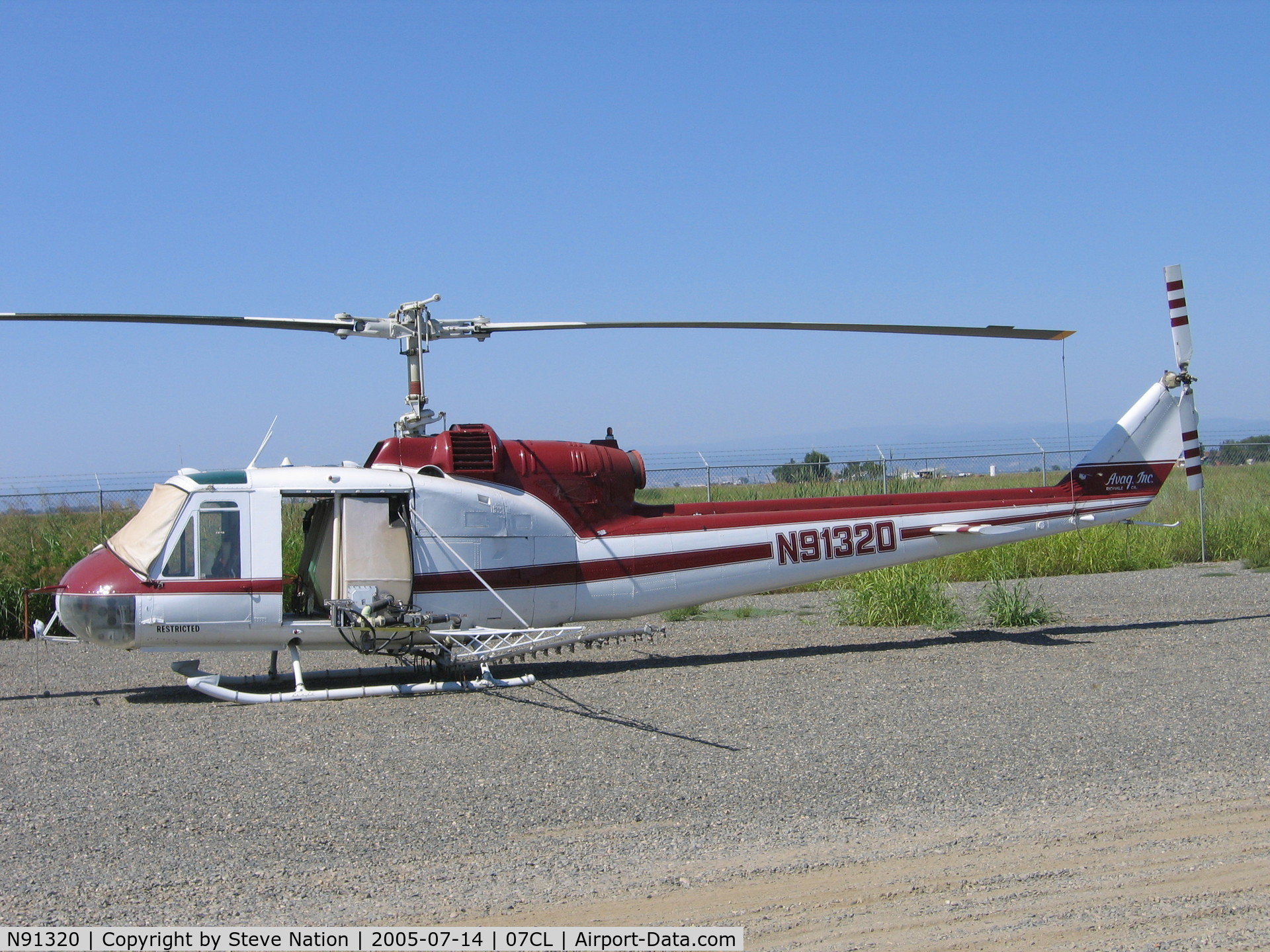N91320, 1962 Bell UH-1B C/N 62-1887, Av Ag Inc. 1962 Bell UH-1B (62-1887) rigged as sprayer at their Richvale, CA base