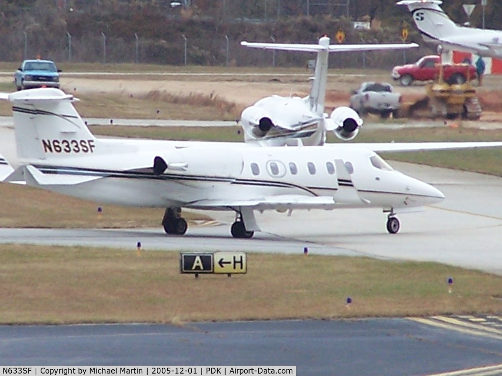 N633SF, 2002 Learjet Inc 31A C/N 241, Taxing to Runway 20L - Busy day!