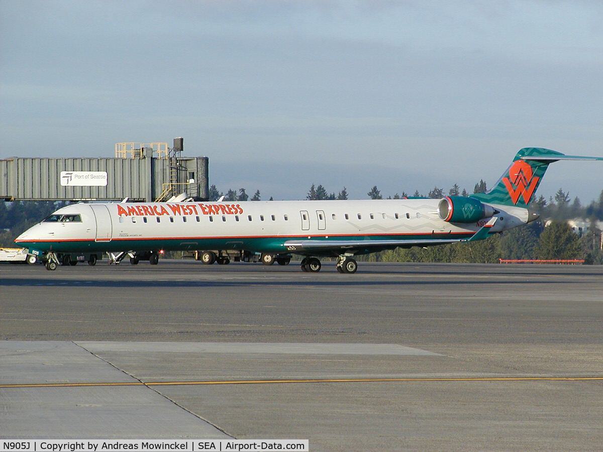 N905J, 2003 Bombardier CRJ-900 (CL-600-2D24) C/N 15005, Freedom Air CRJ-900 at Seattle-Tacoma International Airport.