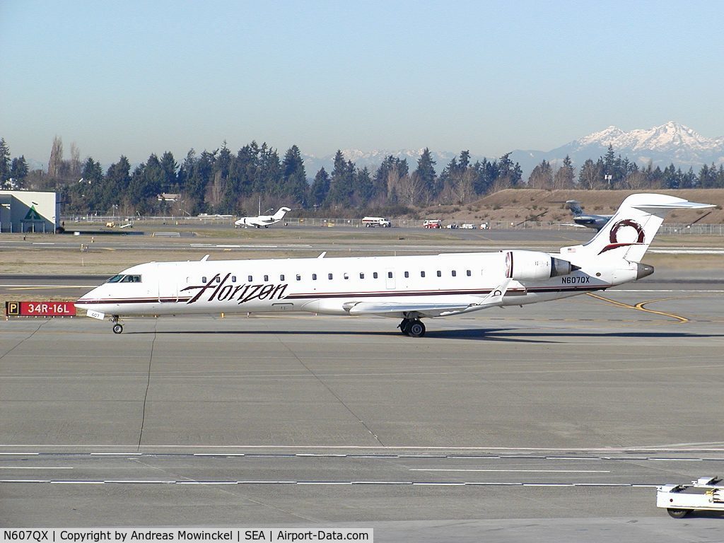 N607QX, 2001 Bombardier CRJ-701 (CL-600-2C10) Regional Jet C/N 10024, Horizon CRJ-700 at Seattle-Tacoma International Airport.