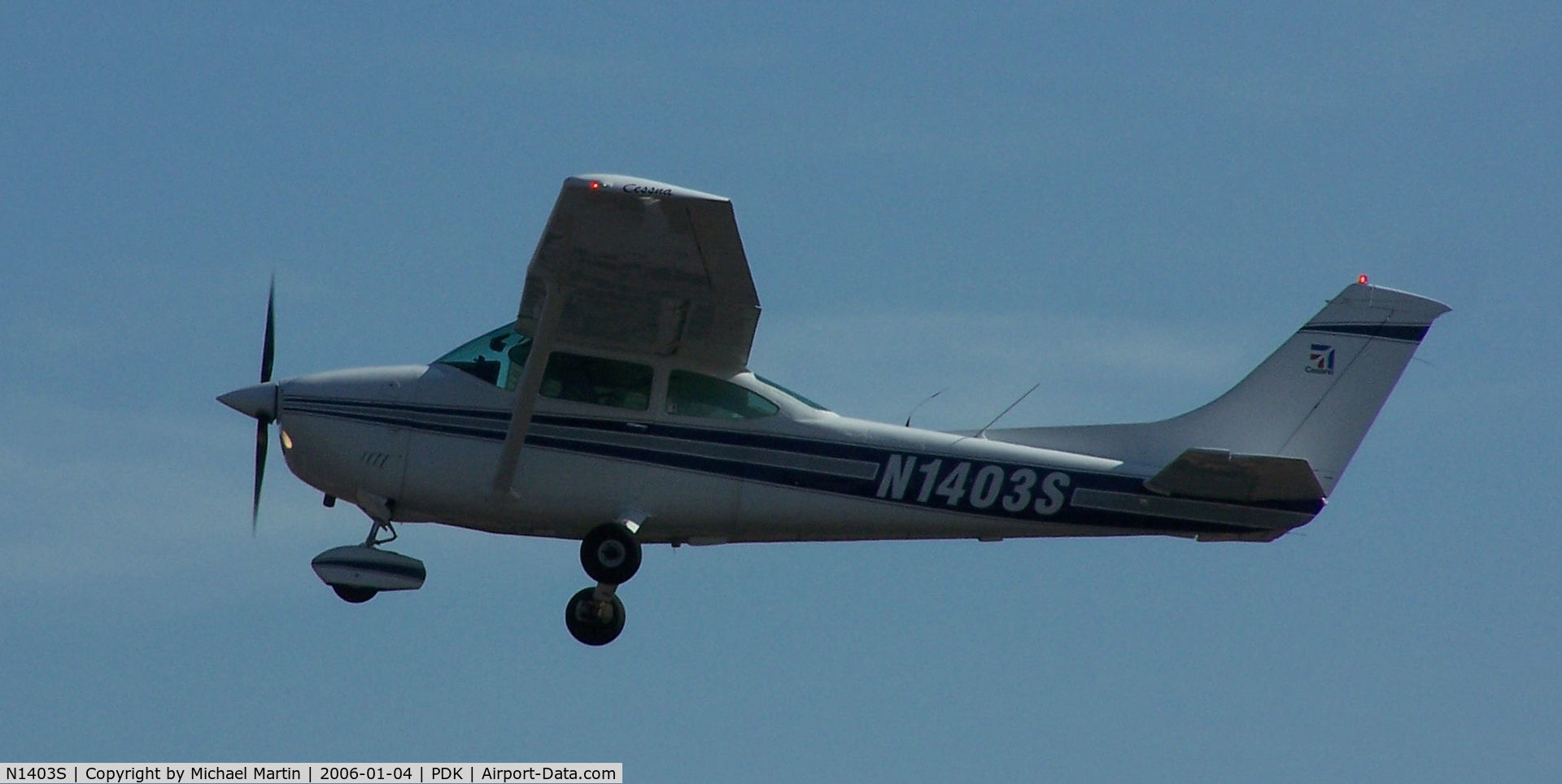 N1403S, 1976 Cessna 182P Skylane C/N 18264963, Departing PDK