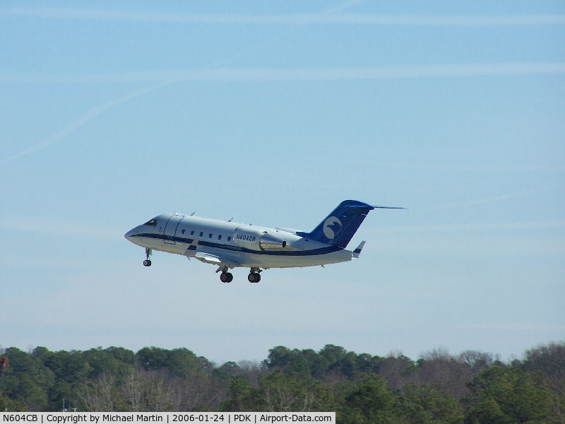 N604CB, 2000 Bombardier Challenger 604 (CL-600-2B16) C/N 5448, Departing PDK - Starting to rotate gear.