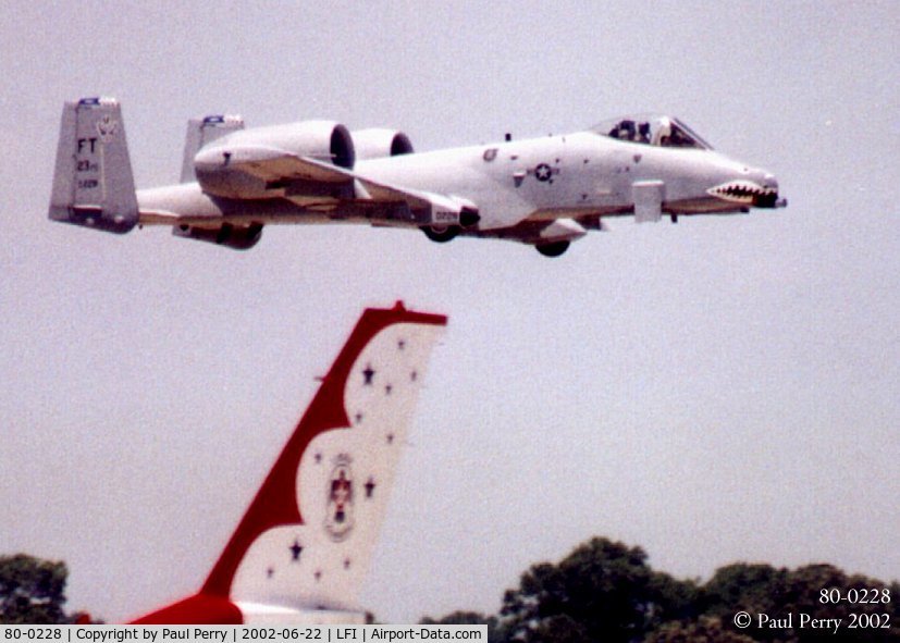80-0228, 1980 Fairchild Republic A-10C Thunderbolt II C/N A10-0578, Quite a contrast, the sleek tail of an F-16, and the pugnacious pulchritude of the Warthog
