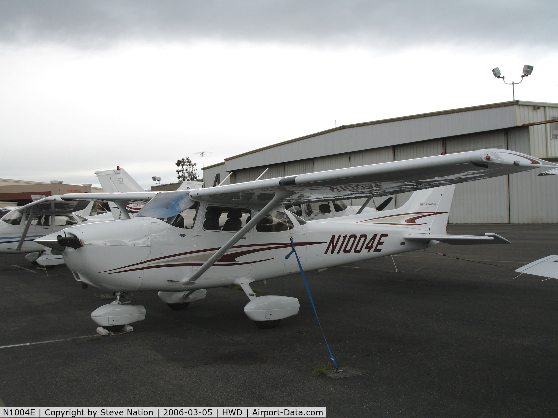 N1004E, 2005 Cessna 172S Skyhawk SP C/N 172S9872, Brand new 2005 Cessna 172S at stormy Hayward Air Terminal, CA