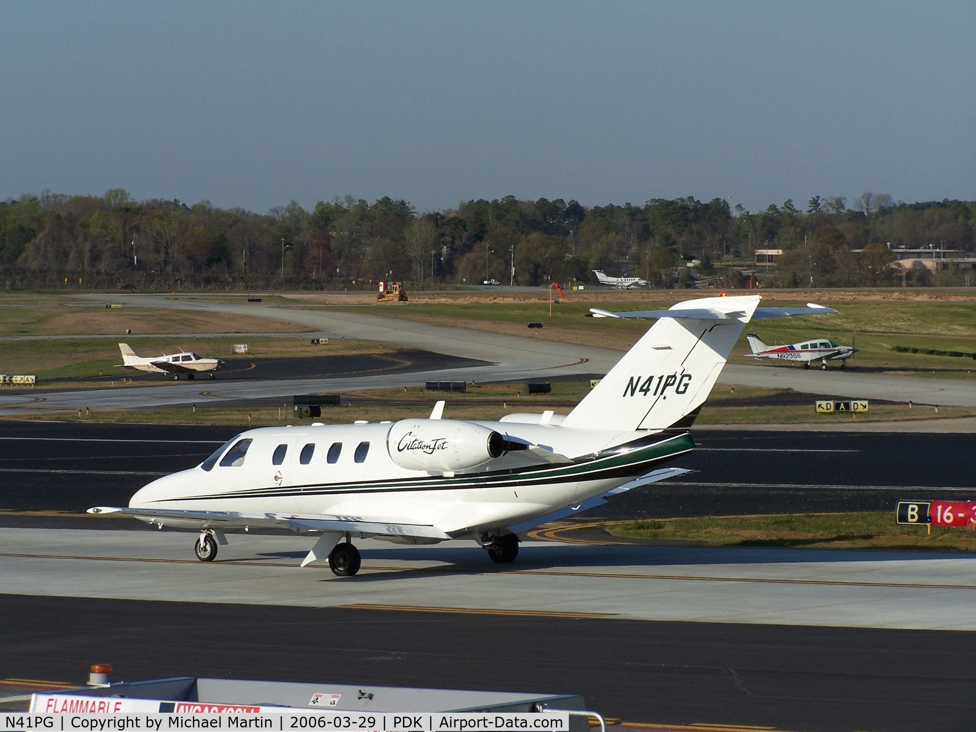 N41PG, 1997 Cessna 525 C/N 525-0175, Taxing to Runway 20L - Busy day!