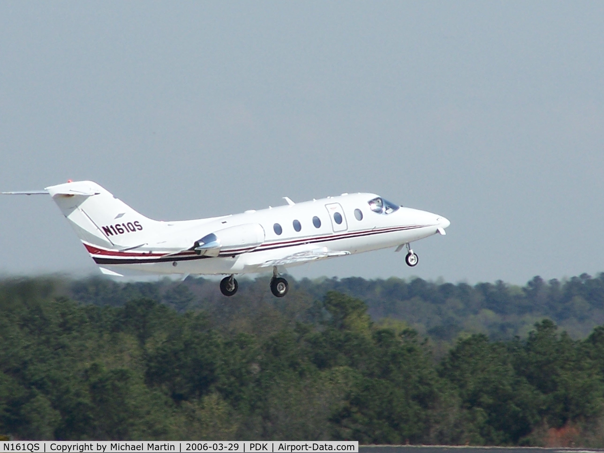 N161QS, Raytheon Aircraft Company 400A C/N RK-435, Departing PDK - Starting to rotate gear.