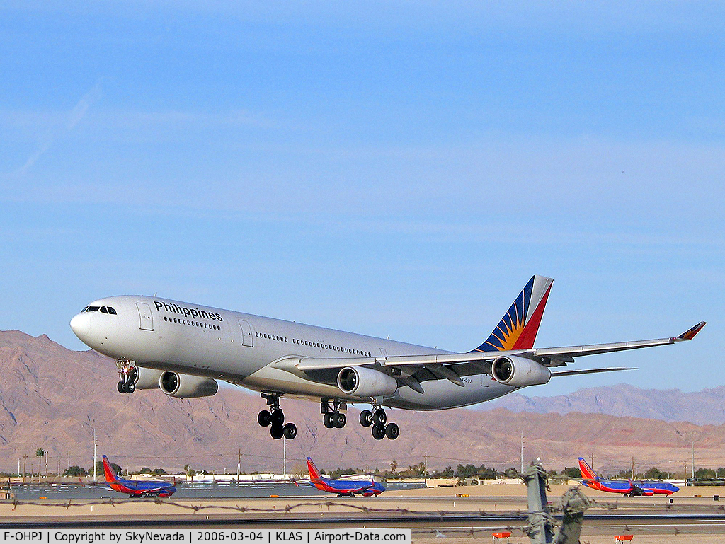 F-OHPJ, 1997 Airbus A340-313X C/N 173, Philippines Airlines / Airbus Industrie A340-313 / I finally get a nice shot and...stupid, stupid fence!