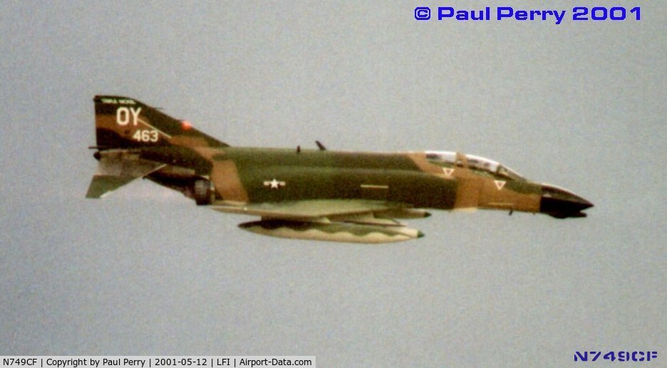 N749CF, 1965 McDonnell F-4D Phantom II C/N 1813 (65-0749), The sky darkens with thunderclouds, and forces Steve Ritchie to cut his demo short
