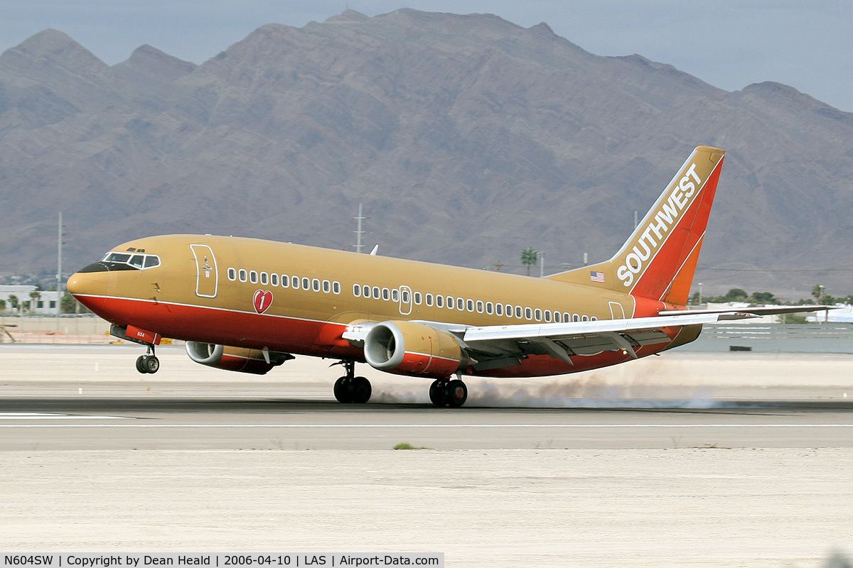 N604SW, 1995 Boeing 737-3H4 C/N 27955, Southwest Airlines N604SW touching down on RWY 25L.