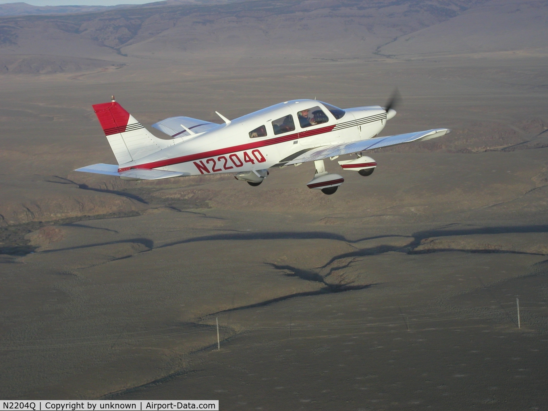 N2204Q, 1977 Piper PA-28-181 C/N 28-7790381, This picture was taken by a chase plane over the nevada desert about four years ago.