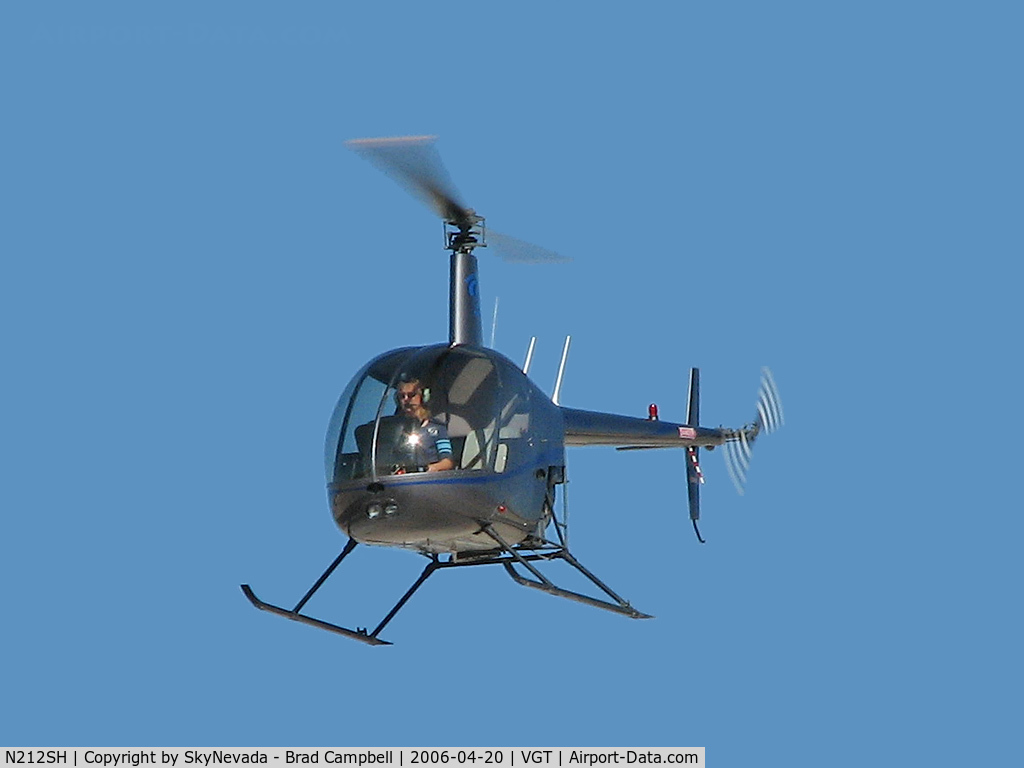 N212SH, 2005 Robinson R22 BETA C/N 3995, Owned by Robinson Helicopter Co. / 2005 Robinson Helicopter R22 BETA / Perhaps that is Mrs. Robinson in the driver's seat?