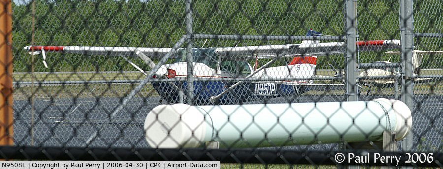 N9508L, 1986 Cessna 172P C/N 17276567, Shooting through TWO fences?  Not recommended.