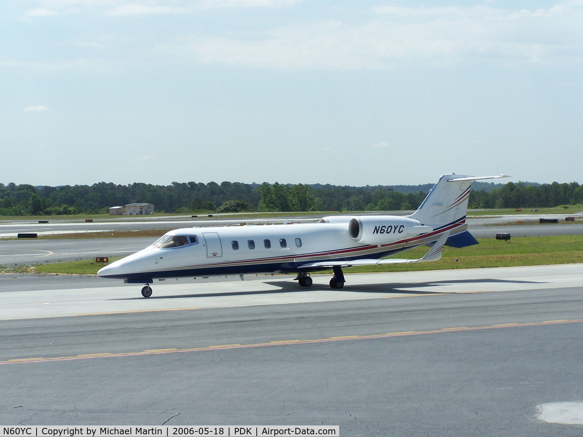 N60YC, 2003 Learjet 60 C/N 267, Taxing to Epps Air Service