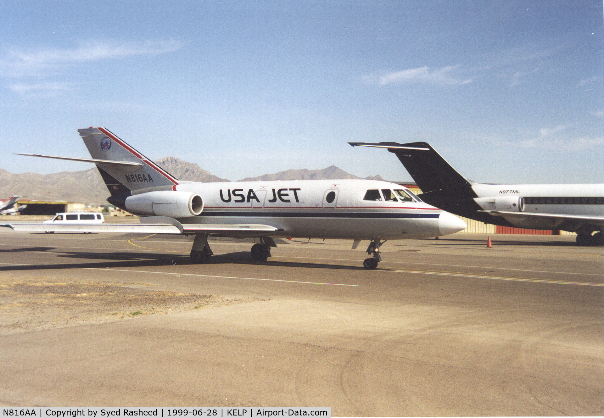 N816AA, 1973 Dassault Falcon (Mystere) 20E C/N 290, Falcon 20 taxing past Grecoair Hanger