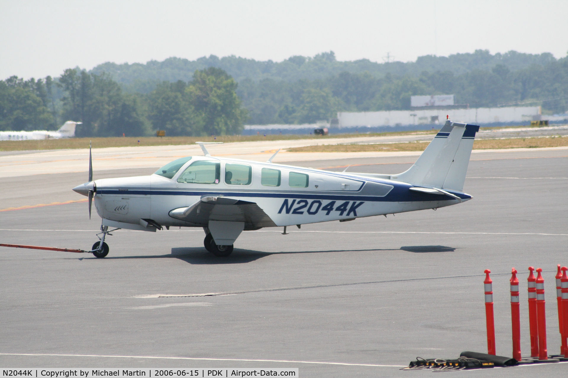 N2044K, 1978 Beech A36 Bonanza 36 C/N E-1389, Being towed to parking at Epps Air Service