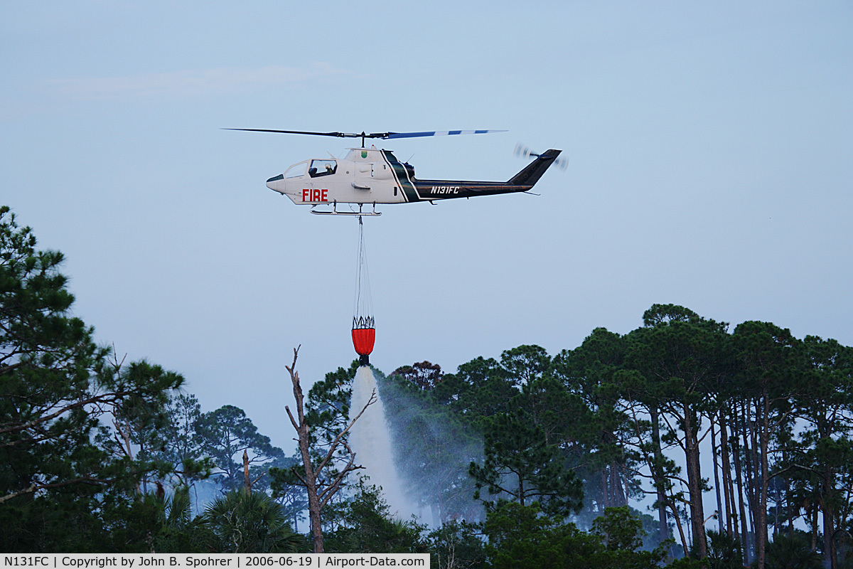 N131FC, Bell AH-1F Cobra C/N 76-22570, AH-1F Cobra on firefighting run near Eastpoint, FL