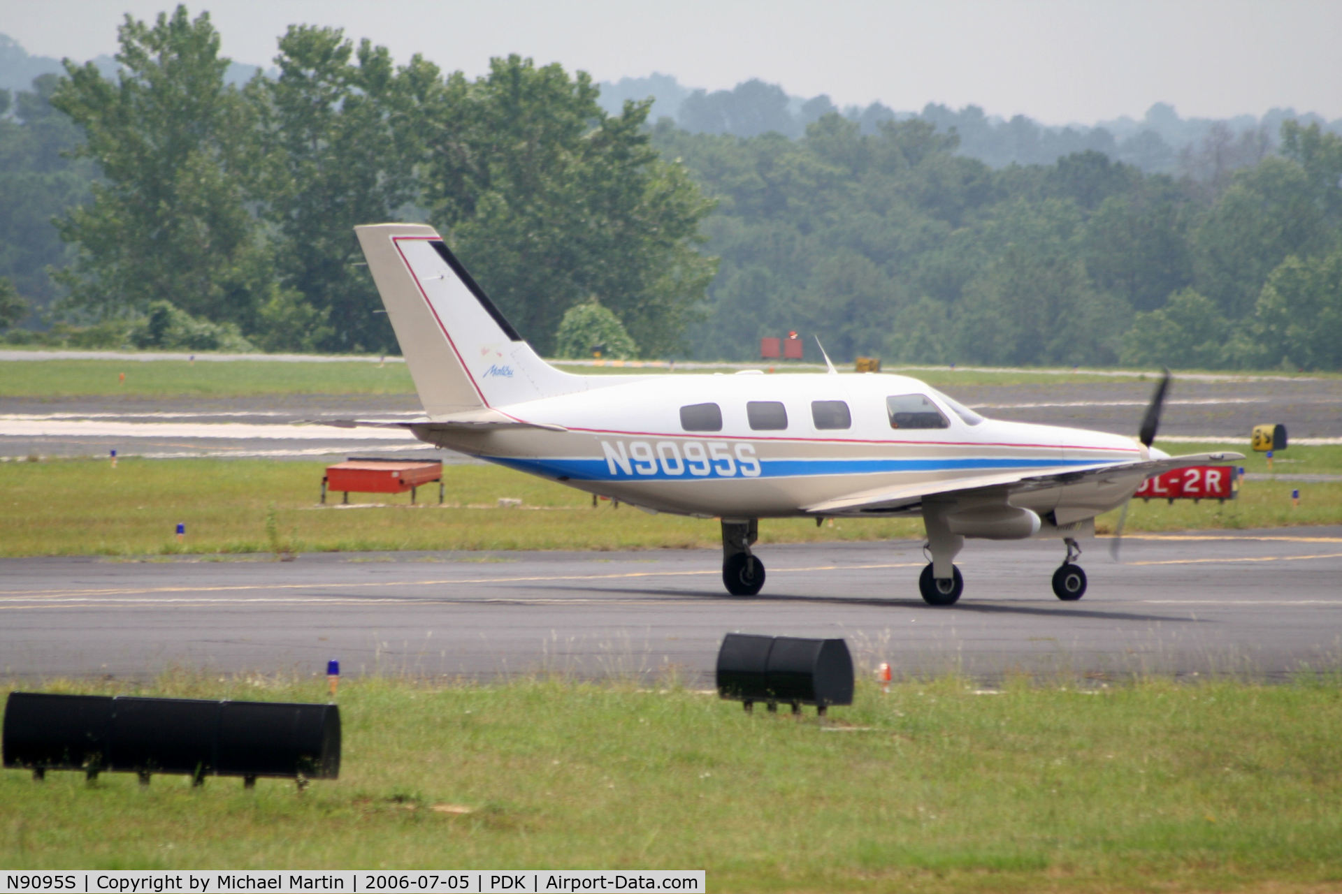 N9095S, 1986 Piper PA-46-310P Malibu C/N 46-8608061, Landing Runway 20R