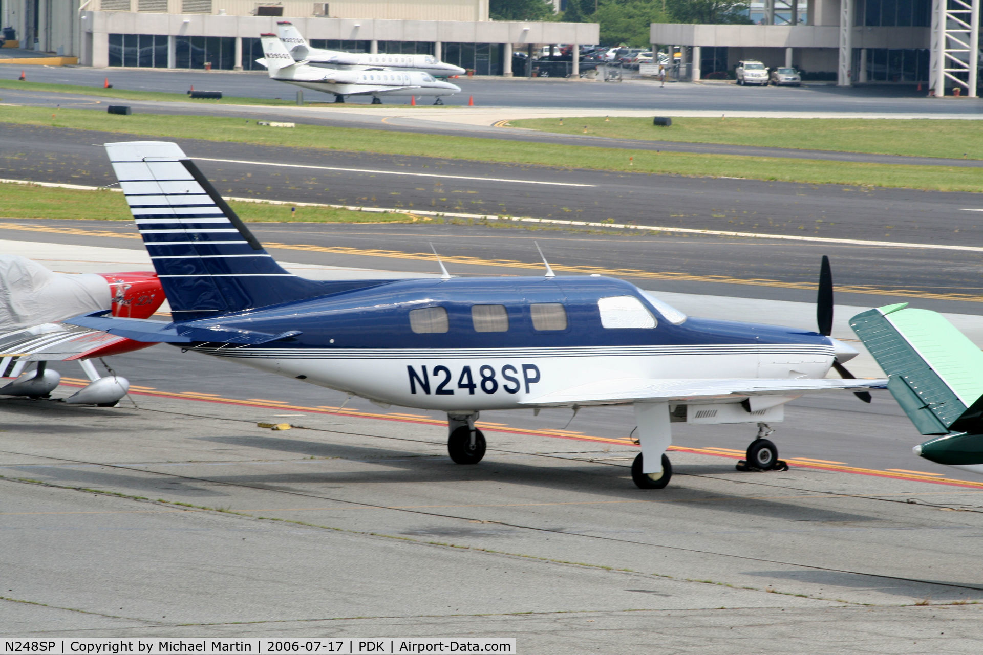 N248SP, 1986 Piper PA-46-310P Malibu C/N 46-8608024, Tied down @ Epps with other aircraft