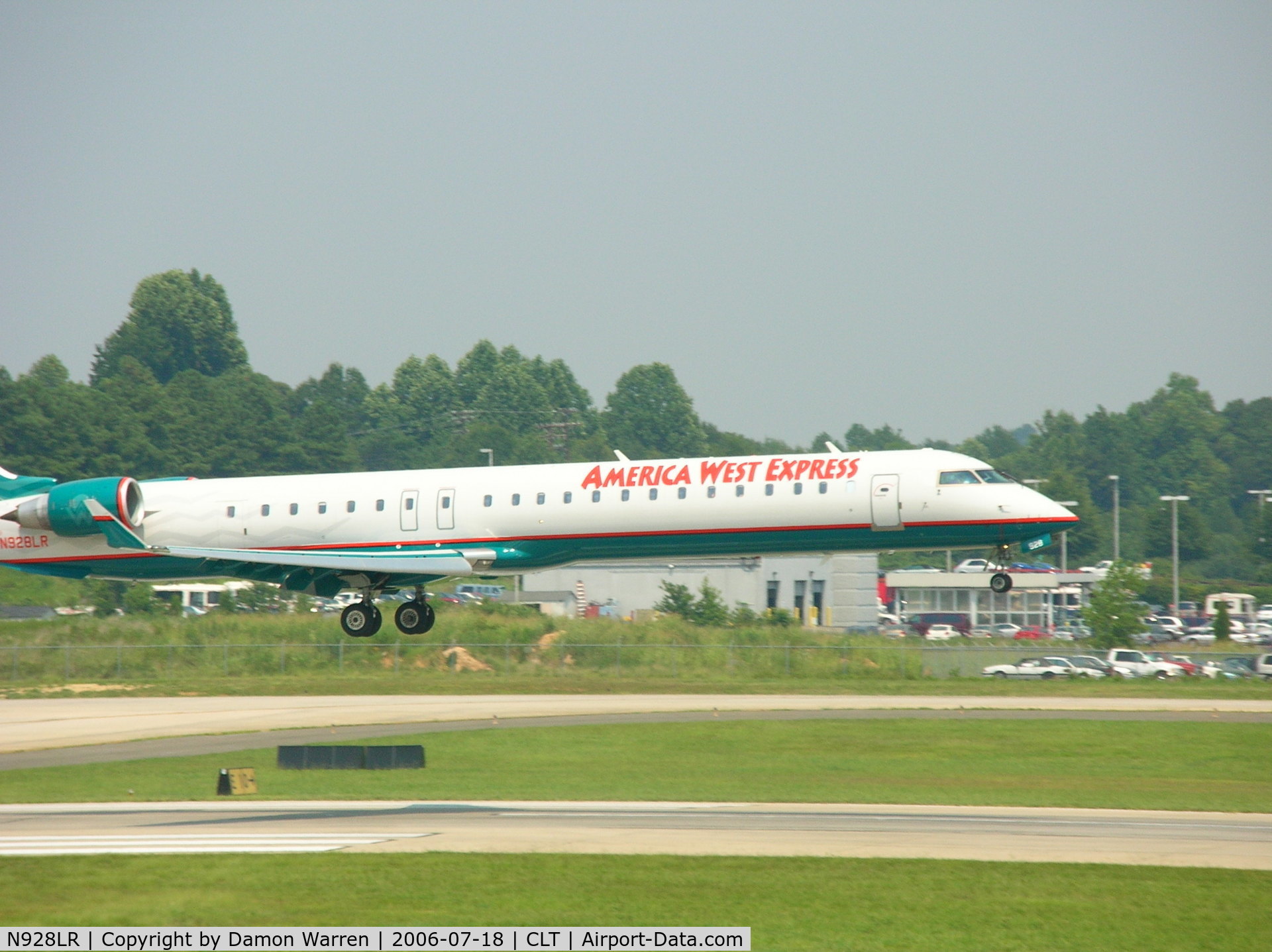 N928LR, 2005 Bombardier CRJ-900ER (CL-600-2D24) C/N 15028, Landing on Runway 18R (tail missing from pic)