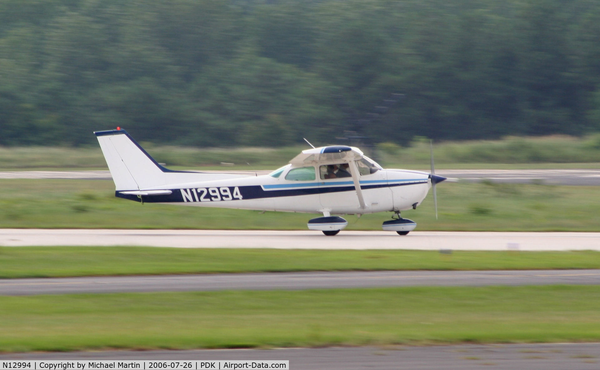 N12994, 1973 Cessna 172M C/N 17262434, Departing 20R enroute to MJD