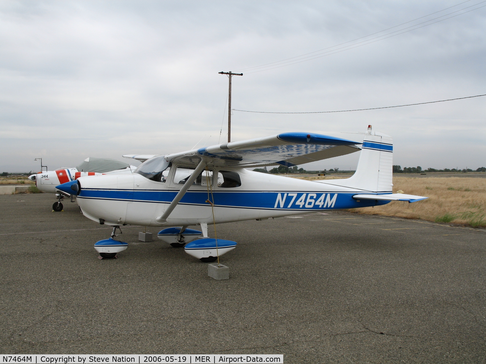 N7464M, 1959 Cessna 175 Skylark C/N 55764, Straight Tail 1959 Cessna 175 in lousy weather @ Castle AFB, CA