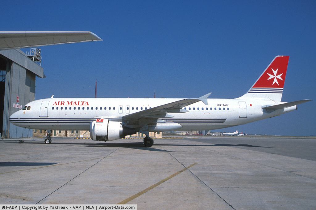 9H-ABP, 1990 Airbus A320-211 C/N 112, Air Malta Airbus A320 being towed into the hangar