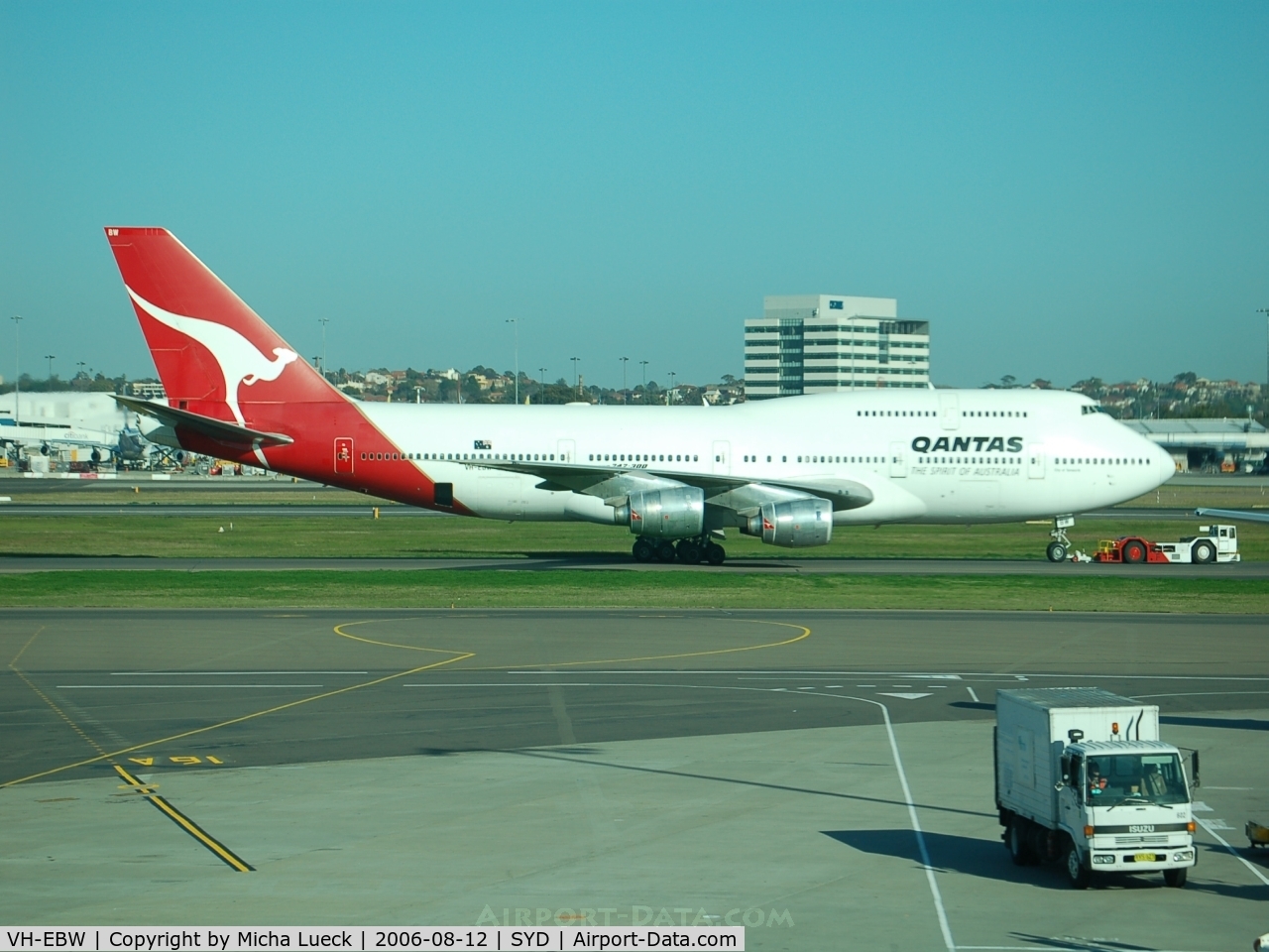VH-EBW, 1986 Boeing 747-338 C/N 23408, Qantas' B747-300 (VH-EBW) being towed to the gate