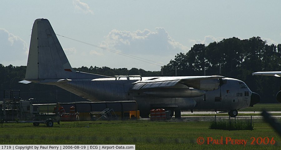 1719, 1986 Lockheed HC-130H Hercules C/N 382-5107, Backlit, a shiny unpainted Herc