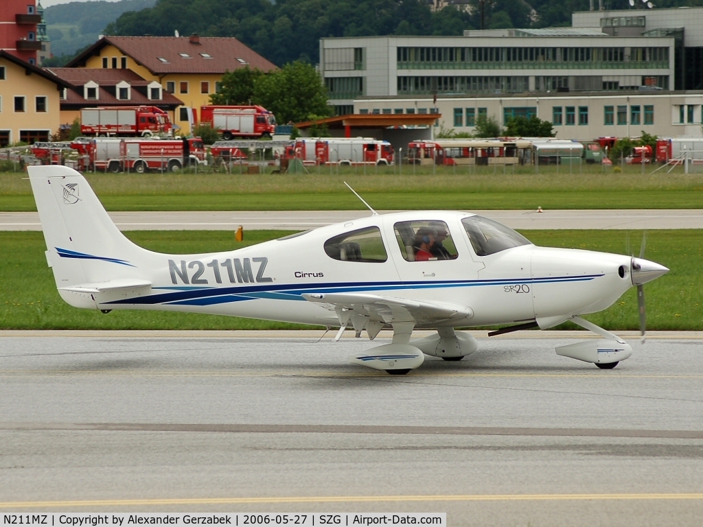 N211MZ, 2003 Cirrus SR20 C/N 1340, Passing by the Fire Brigade training ground while taxiing to runway 34