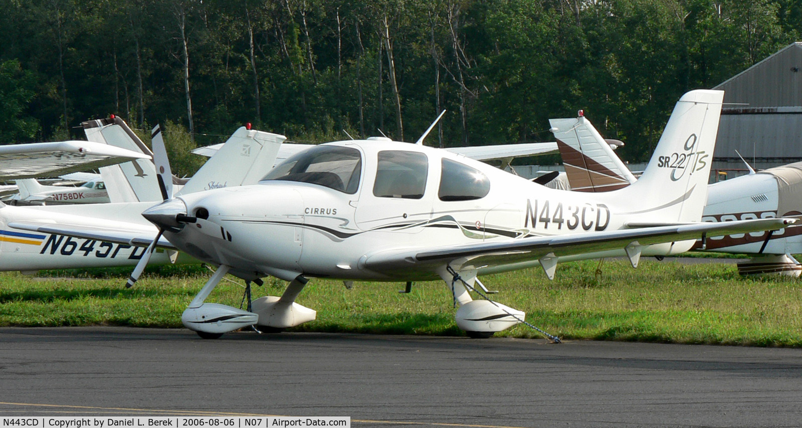 N443CD, 2004 Cirrus SR22 C/N 1190, New Cirrus shows her plumage on the crowded ramp at Lincoln Park, NJ.