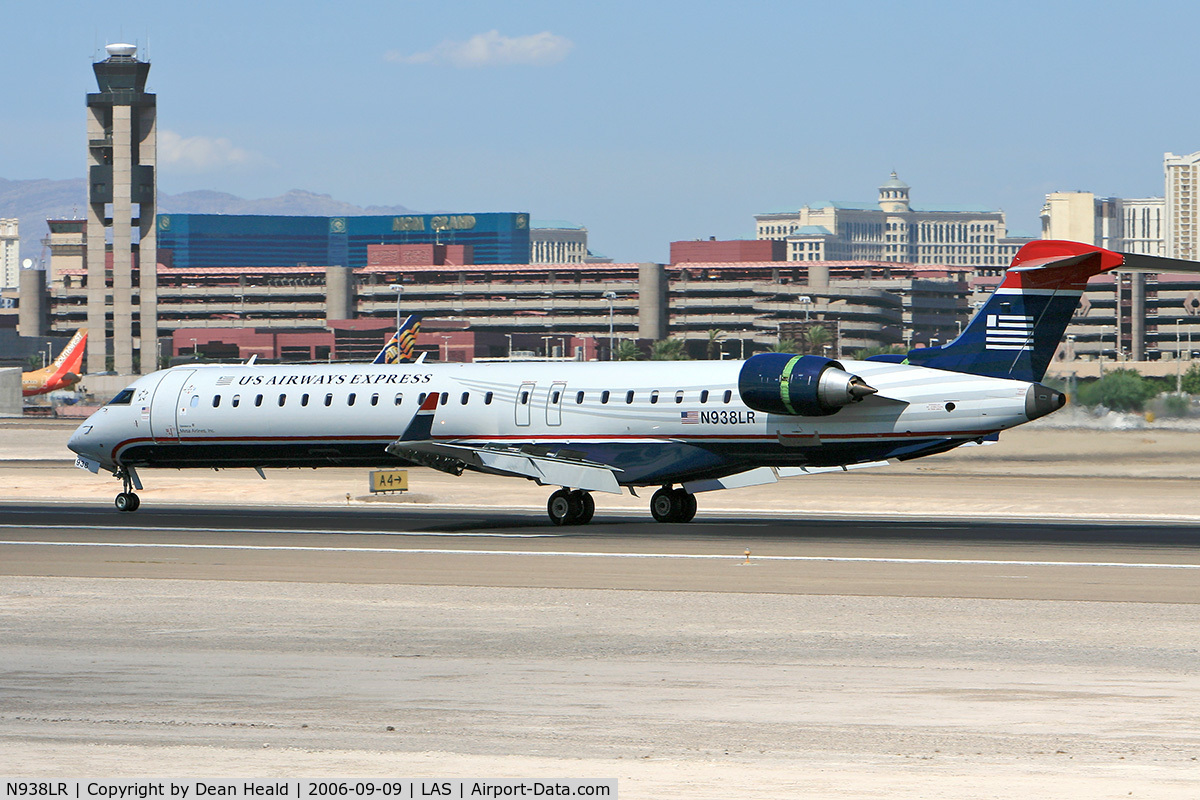 N938LR, 2005 Bombardier CRJ-900ER (CL-600-2D24) C/N 15038, US Airways Express (Mesa Airlines) N938LR (FLT ASH2969) from Los Angeles Int'l (KLAX) rolling out after landing on RWY 25L.