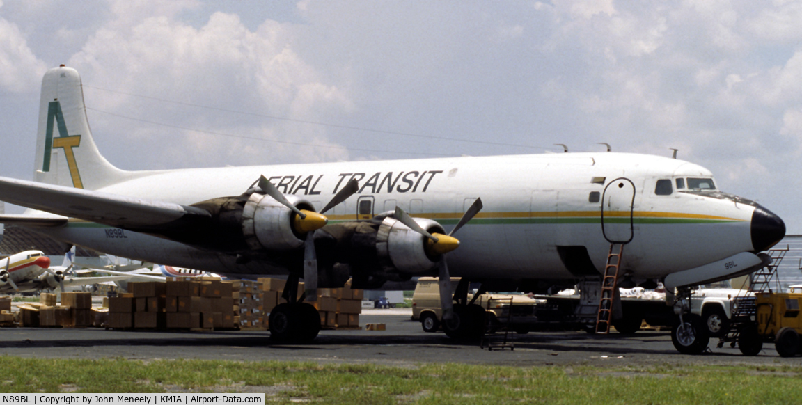 N89BL, 1957 Douglas DC-6A C/N 45374, Waiting for another load of freight. July 1990.