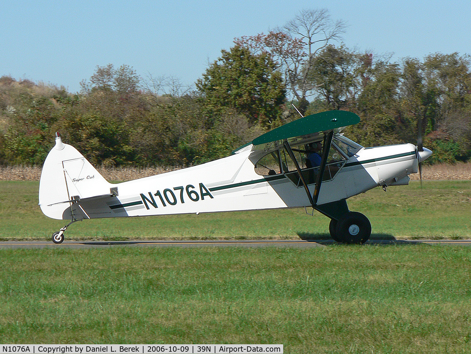 N1076A, 1951 Piper PA-18 C/N 18-659, Handsome 1951 Super Cub taxies out at Princeton Airport.
