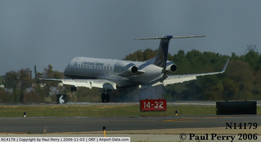 N14179, 2005 Embraer ERJ-145XR (EMB-145XR) C/N 14500896, An Embraer, getting some smoke on landing
