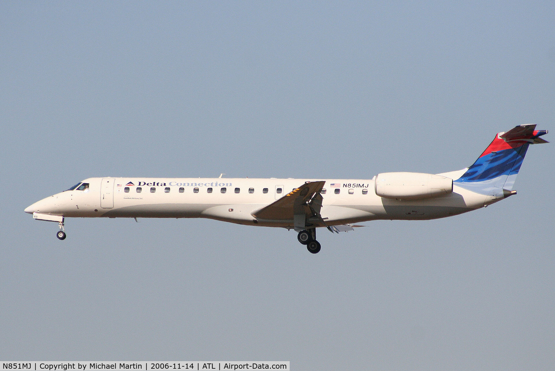 N851MJ, 2002 Embraer EMB-145LR C/N 145572, Over the numbers of 27L