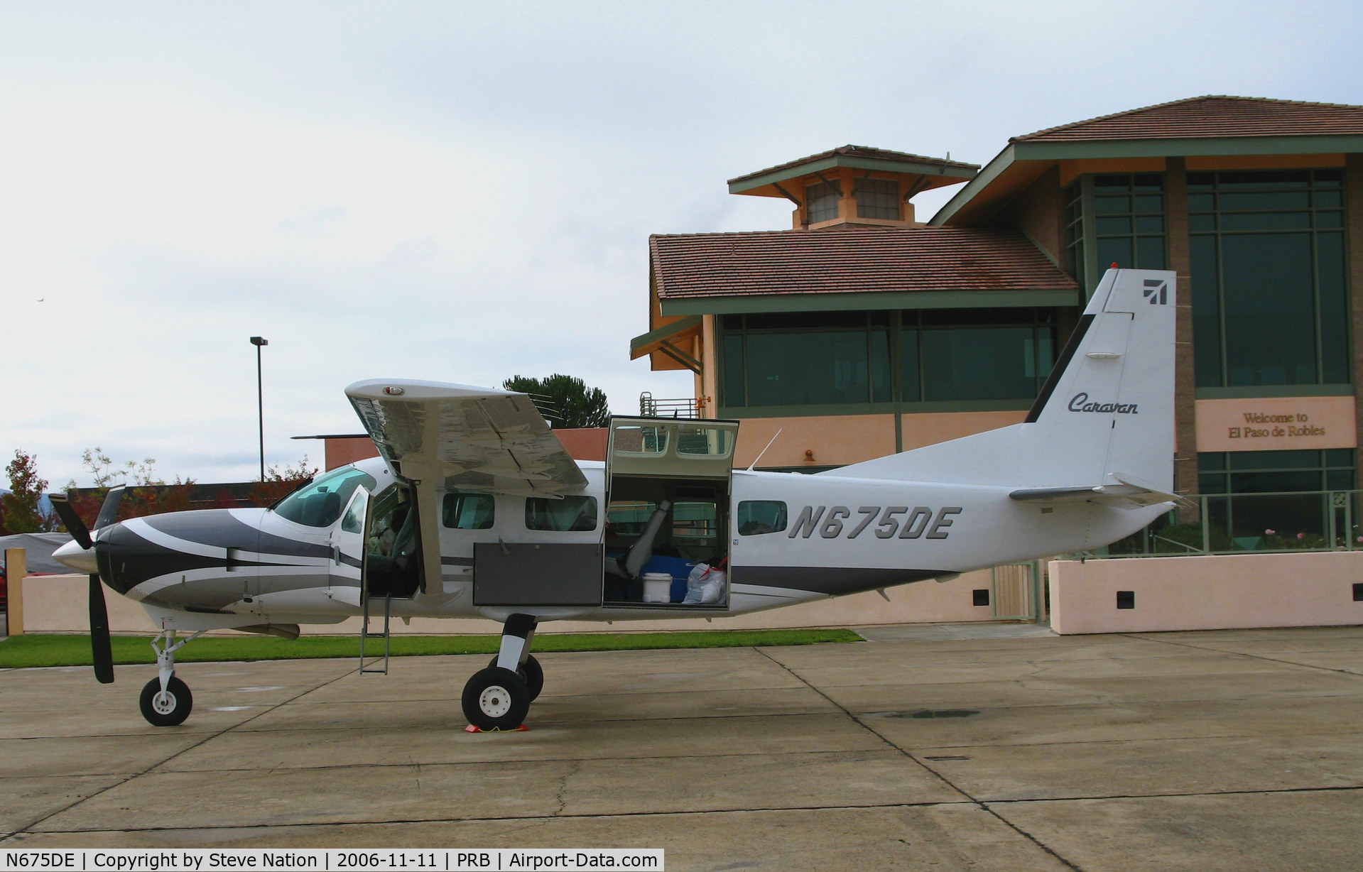 N675DE, 2003 Cessna 208 Caravan I C/N 20800366, check out the white, furry co-pilot (proof the 