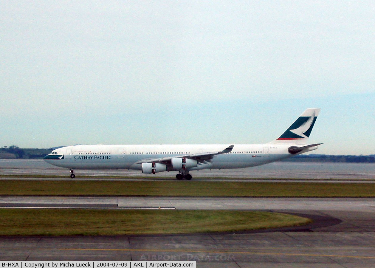 B-HXA, 1996 Airbus A340-313 C/N 136, just touched down- thrust reversers deployed