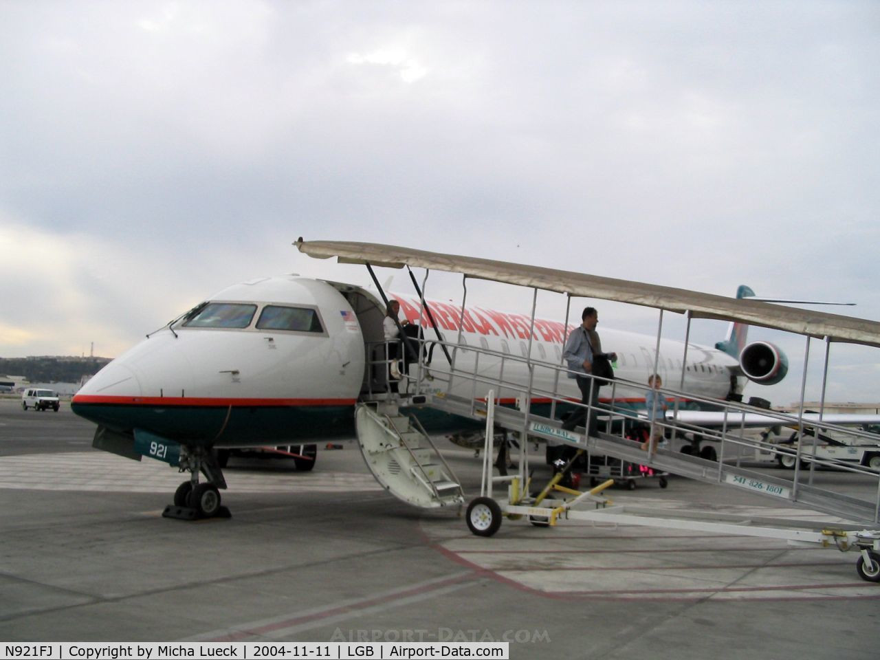 N921FJ, 2004 Bombardier CRJ-900ER (CL-600-2D24) C/N 15021, Gangway for cattle ;-)