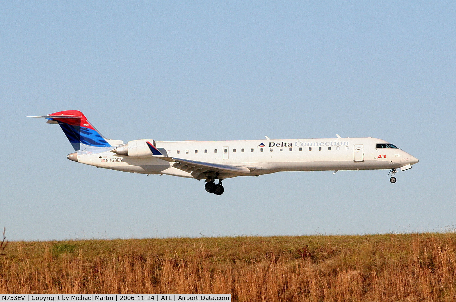 N753EV, 2004 Bombardier CRJ-701 (CL-600-2C10) Regional Jet C/N 10169, Over the numbers of 9R