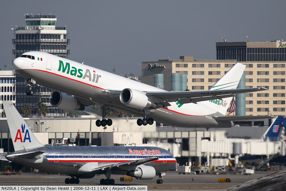 N420LA, 2006 Boeing 767-316F C/N 34627, Mas Air N420LA departing RWY 25R, with AAL4 taxiing for departure to JFK.