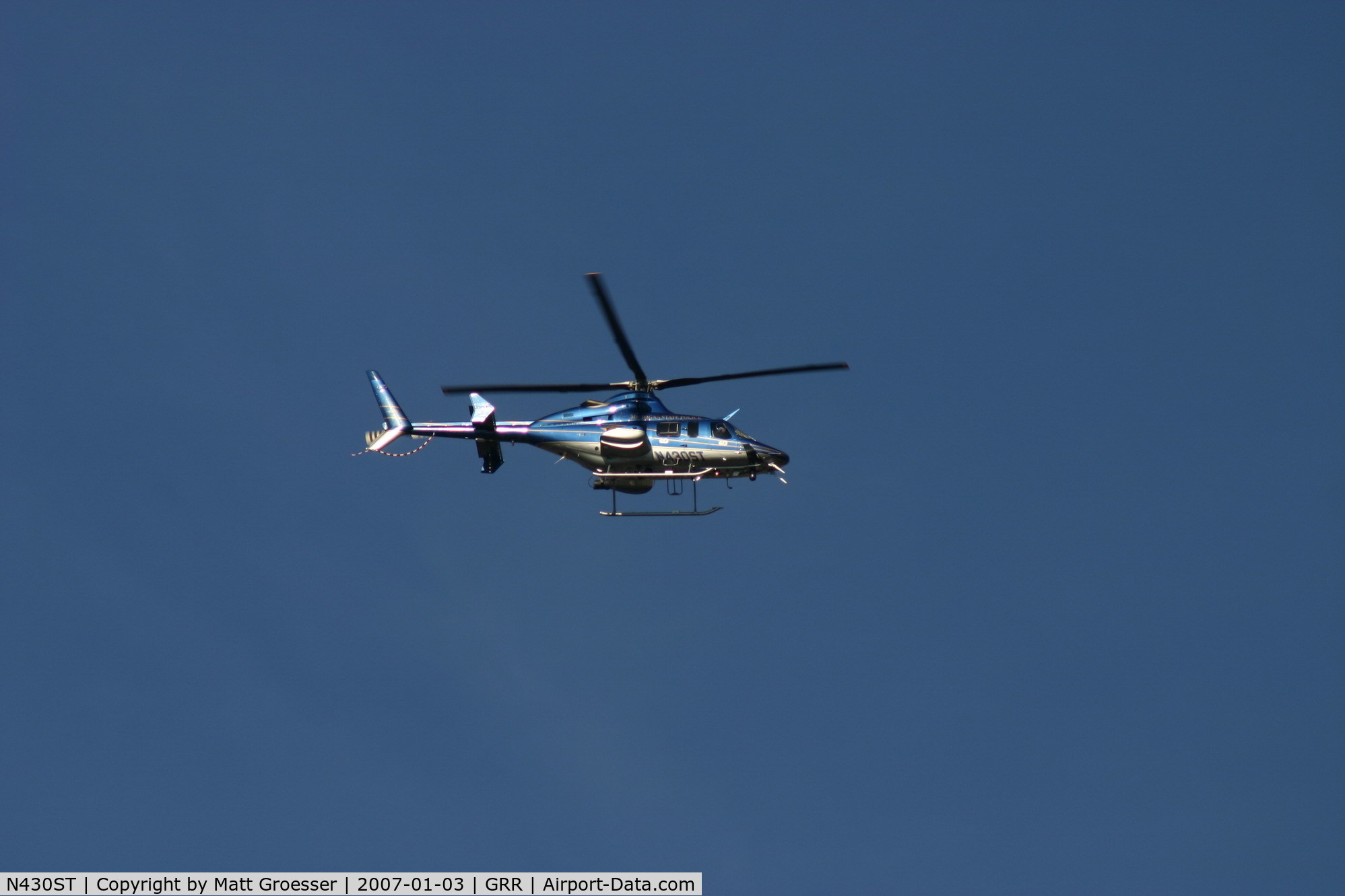 N430ST, 2000 Bell 430 C/N 49071, MSP helicopter over East Grand Rapids Church for Gerald R. Ford funeral security detail