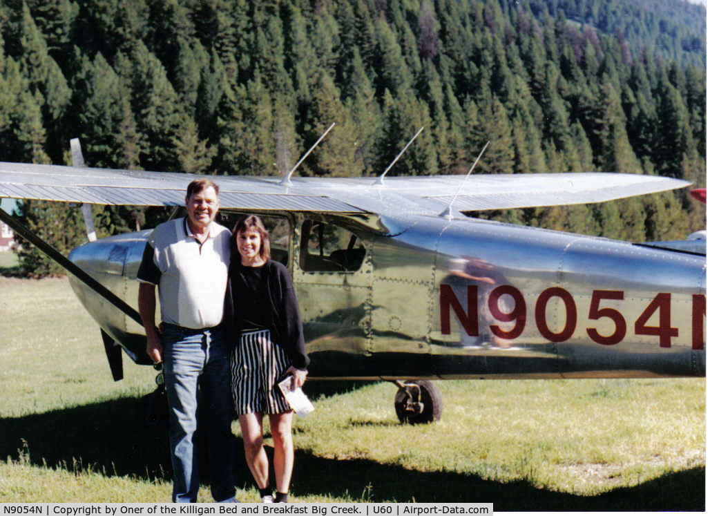 N9054N, 1959 Cessna 182B Skylane C/N 51716, Owner and daughter in front of 9054N at Big Creek Idaho landing strip.