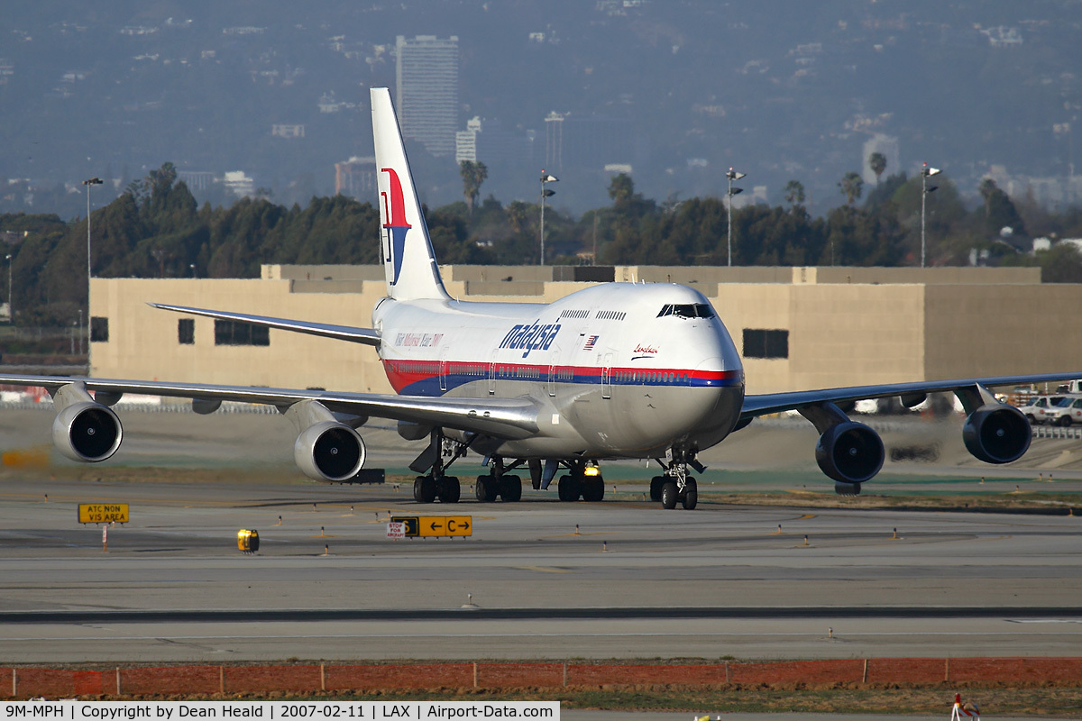 9M-MPH, 1994 Boeing 747-4H6(BDSF) C/N 27044, Malaysia Airlines 9M-MPH taxiing through the alley after arrival on the north complex.