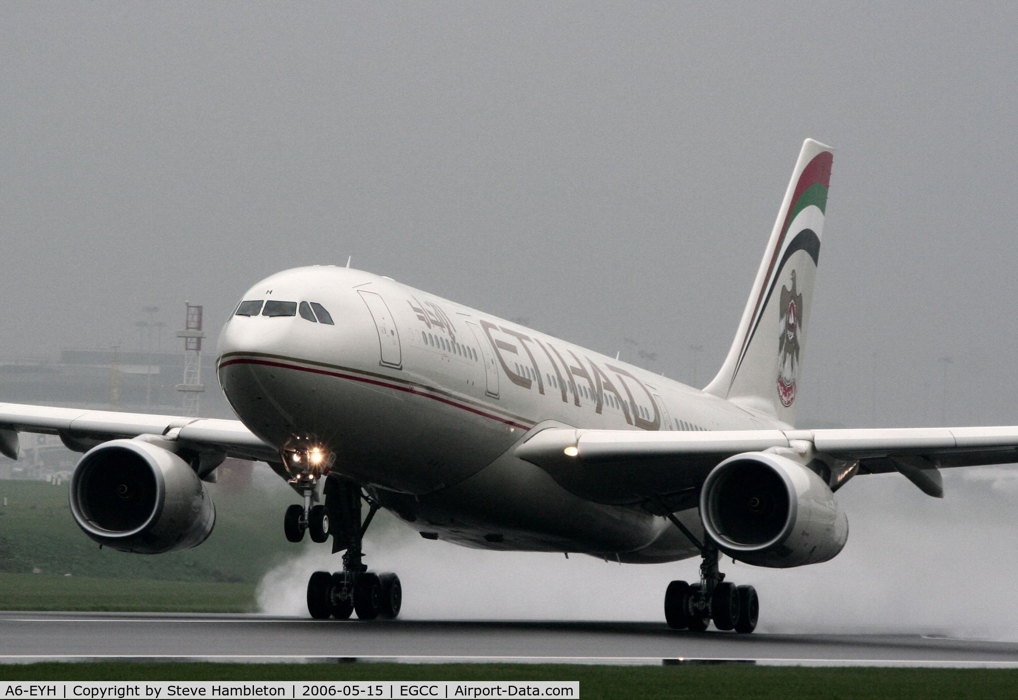 A6-EYH, 2006 Airbus A330-243 C/N 729, Leaving a rainy Manchester for Abu Dhabi