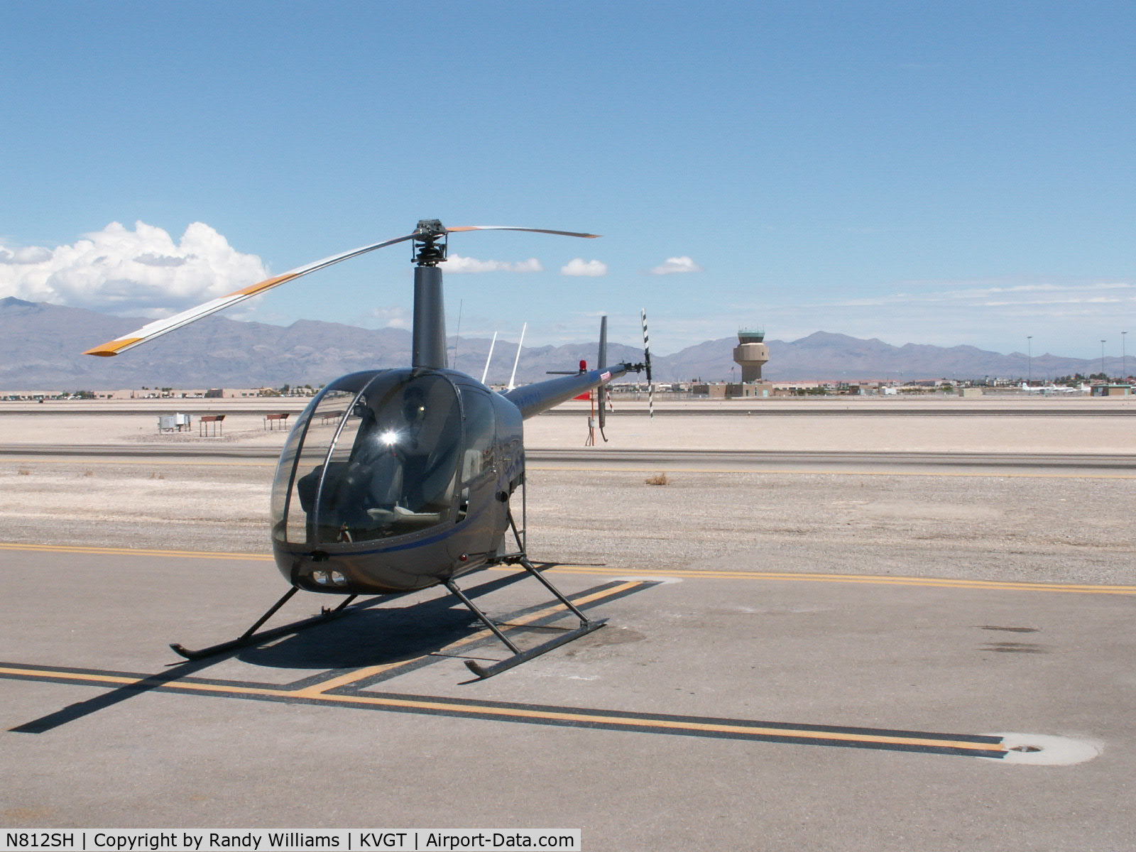 N812SH, 2004 Robinson R22 Beta C/N 3743, Silver State #53 (N812SH)at VGT in front of VGT tower.