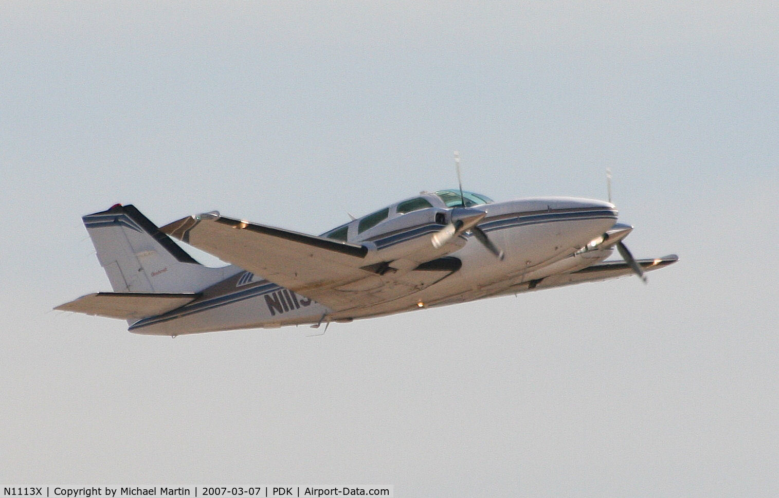 N1113X, 1997 Raytheon Aircraft Company 58 C/N TH-1813, Departing PDK enroute to TVI