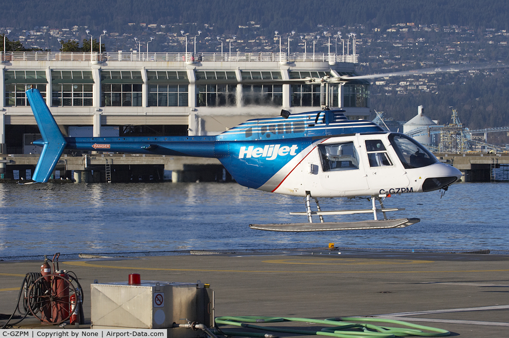 C-GZPM, 1972 Bell 206B JetRanger II C/N 880, Bell 206L-1 Long Ranger II taking off from Vancouver Harbour HeliJet pad.